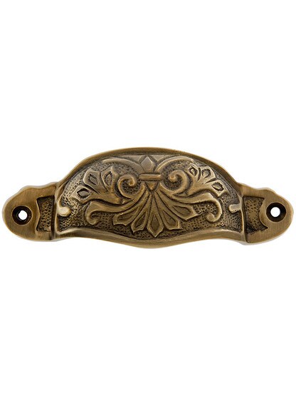 4 3/8 inch Palmette Bin Pull in Antique Brass.